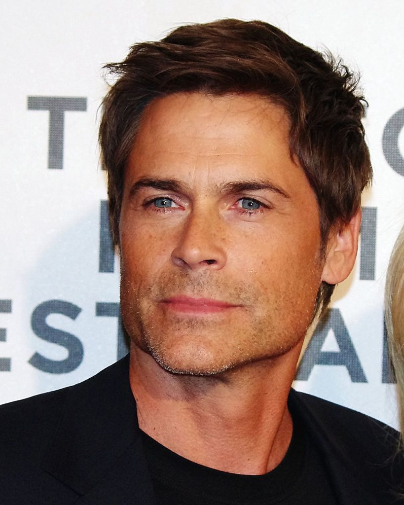 Rob Lowe profile image in a black shirt and jacket with a little scruff