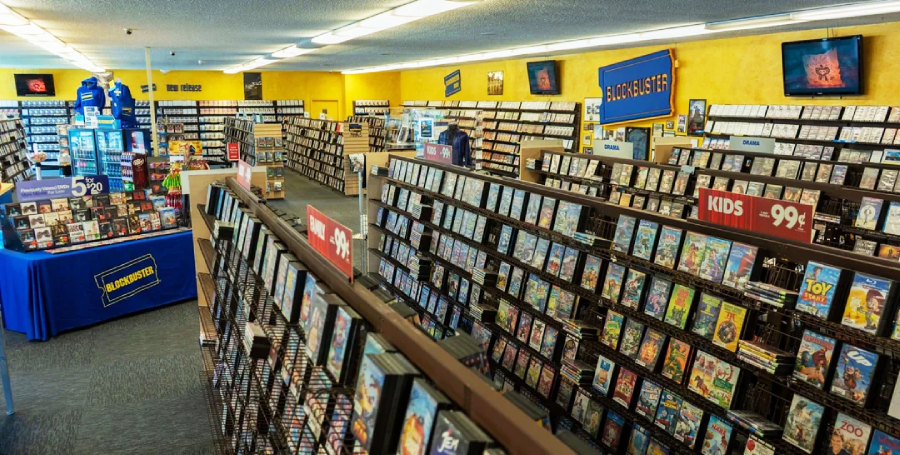Inside photo of Blockbuster Video store with rows of videos
