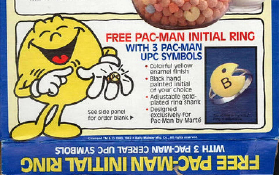 box of pacman cereal with a free ring as a cereal prize from the 80s