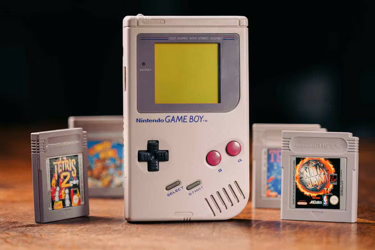 vintage 80s Nintendo game boy with game cartridges to play retro handheld