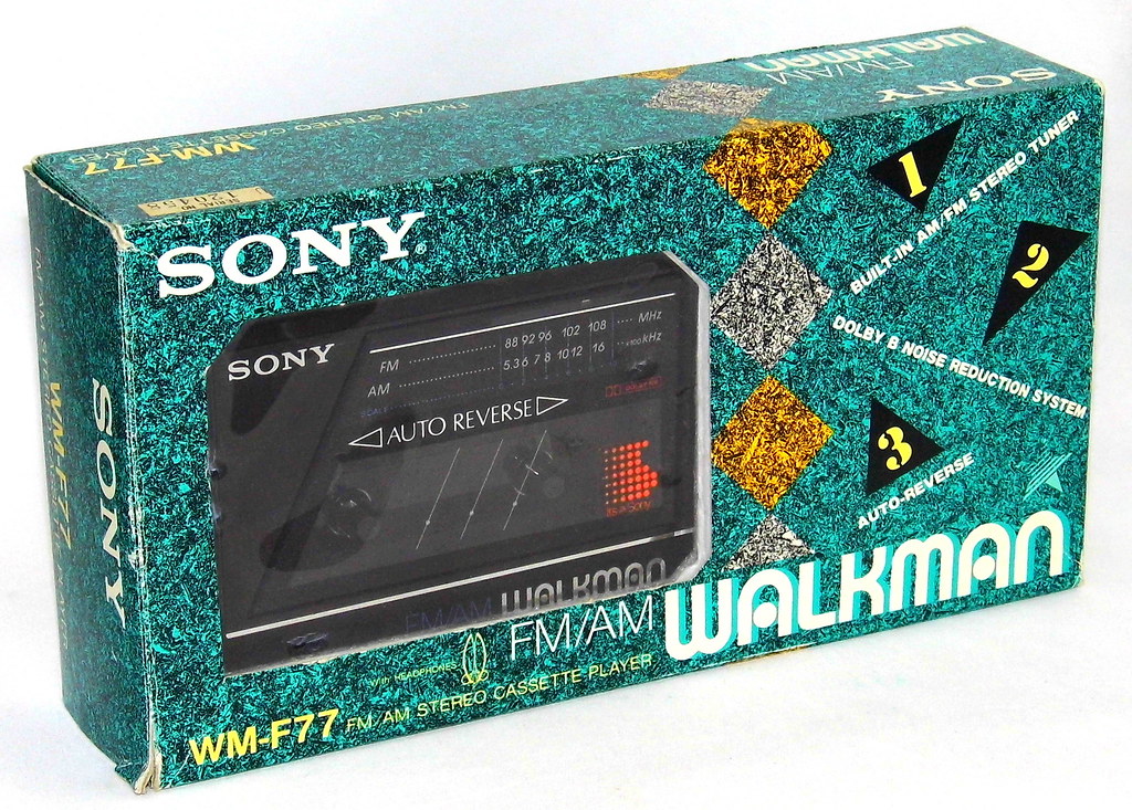 a cool new in box vintage 80s sony walkman in a green box.
