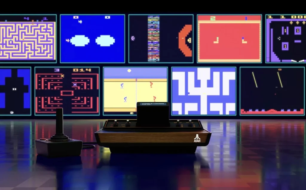 Atari 2600 game system in front of tv with retro video games