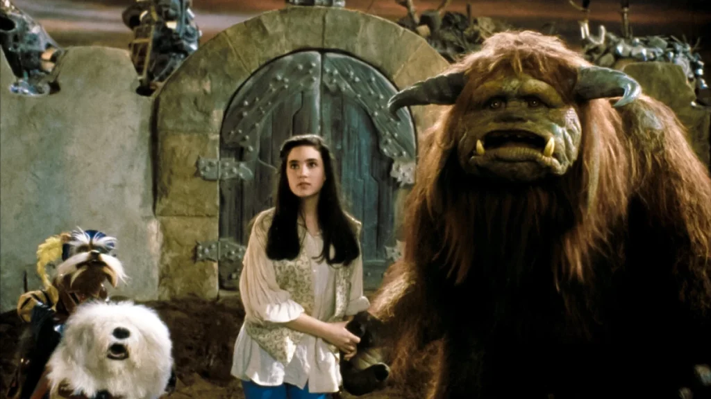 Sarah, Sir Didymus, Ludo, and the dog in the Labyrinth David Bowie movie 1980s cult classic movie